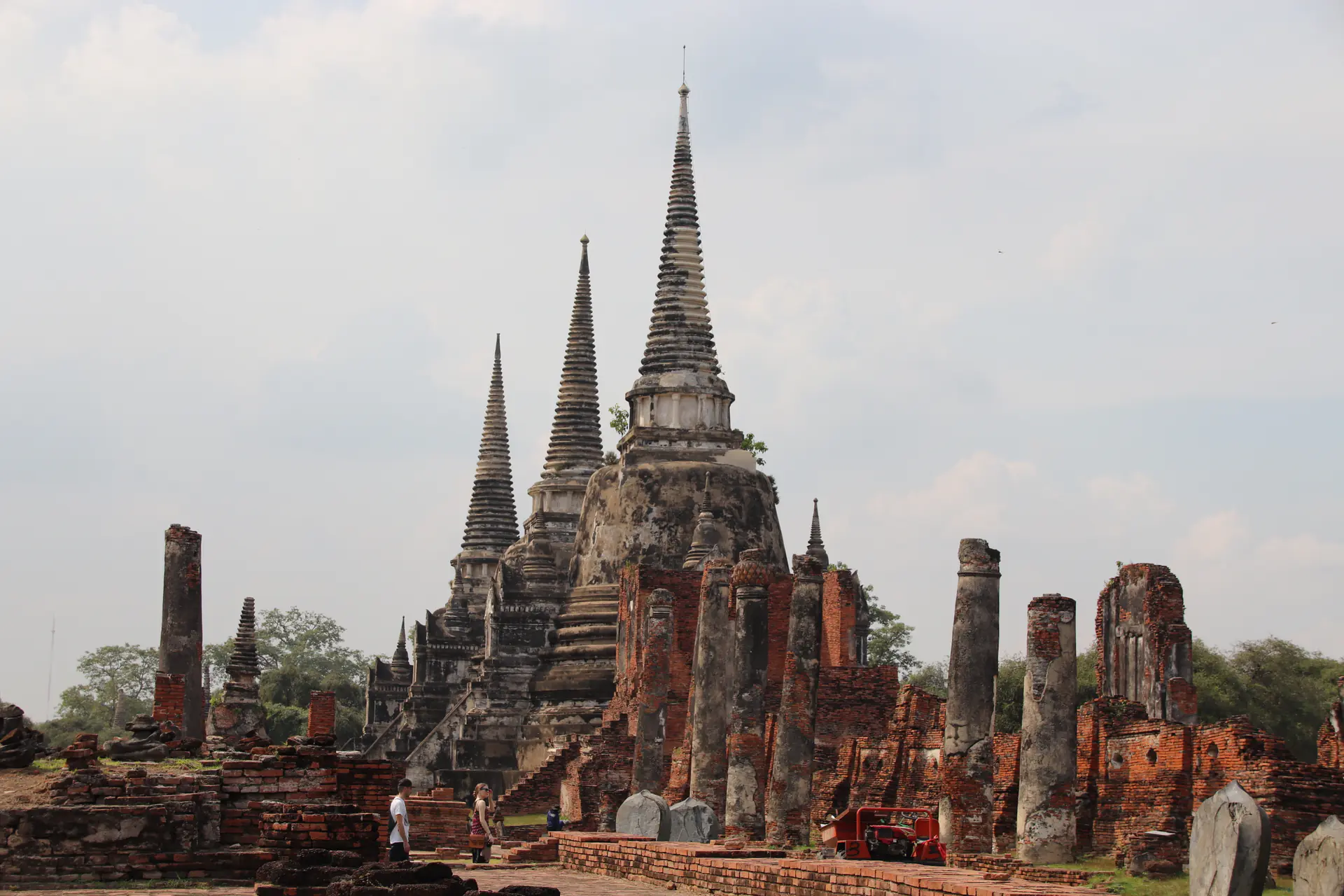 Ancient brick ruins and three bell-shaped chedis of Wat Phra Si Sanphet royal palace site in Ayutthaya