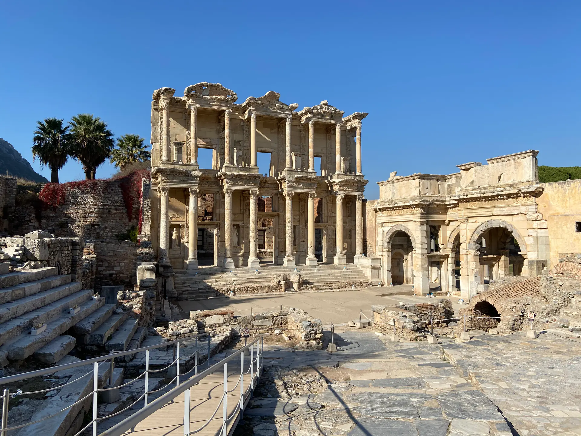 Detailed view of the Library of Celsus showing its magnificent Corinthian columns, sculptural niches, and two-story Roman architecture at Ephesus